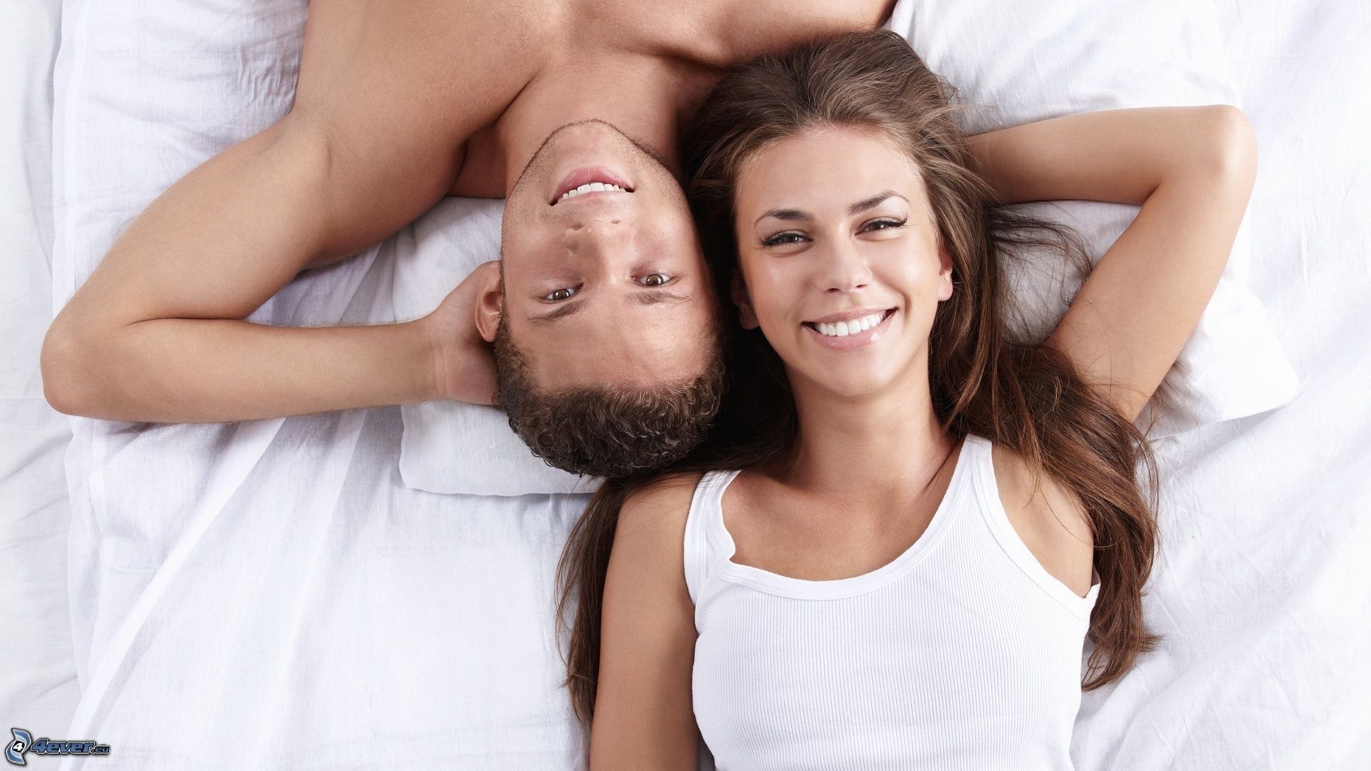 couple-on-bed-159679